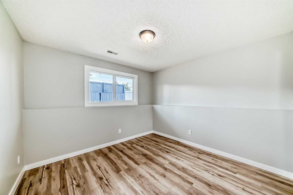 F-903 44 Street Se, Calgary, AB - Indoor Photo Showing Other Room