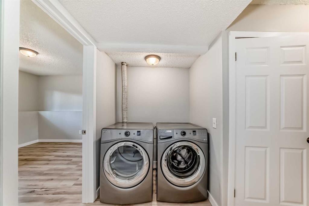 F-903 44 Street Se, Calgary, AB - Indoor Photo Showing Laundry Room