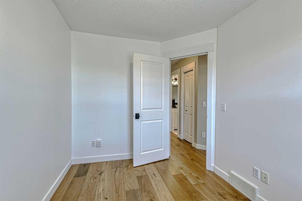 179 Rainbow Falls Drive, Chestermere, AB - Indoor Photo Showing Other Room