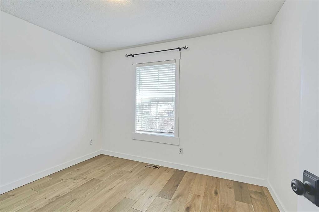 179 Rainbow Falls Drive, Chestermere, AB - Indoor Photo Showing Other Room