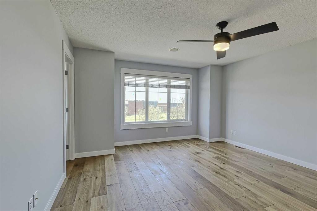 179 Rainbow Falls Drive, Chestermere, AB - Indoor Photo Showing Other Room