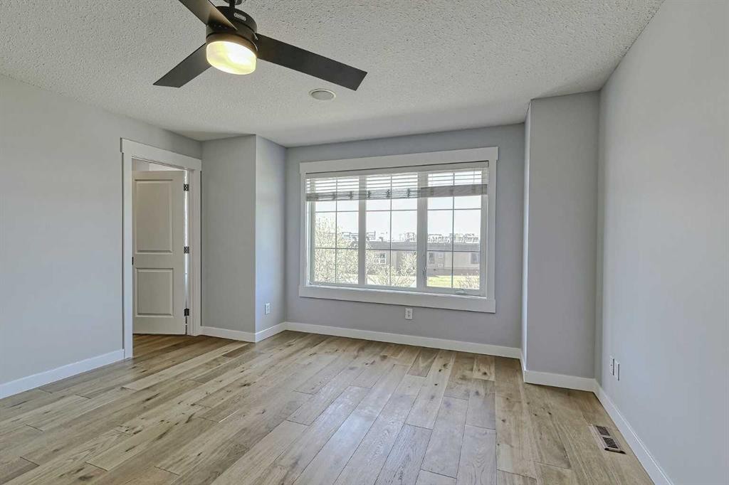 179 Rainbow Falls Drive, Chestermere, AB - Indoor Photo Showing Other Room
