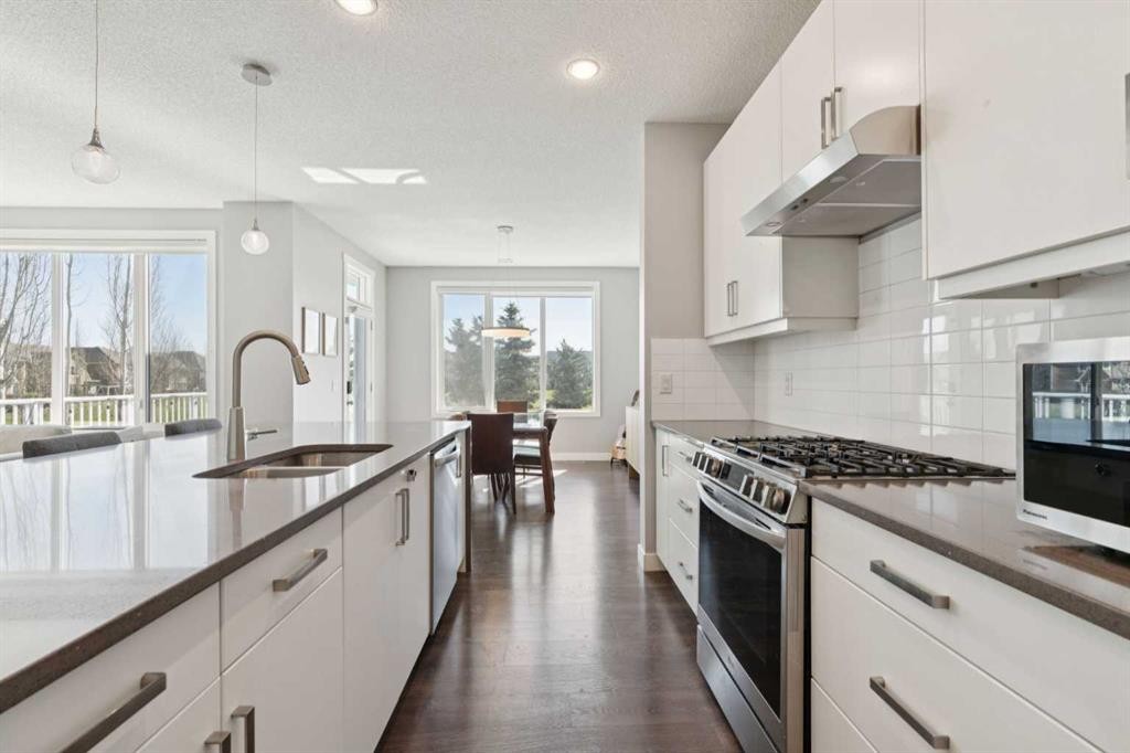 52 Mahogany Way Se, Calgary, AB - Indoor Photo Showing Kitchen With Double Sink With Upgraded Kitchen