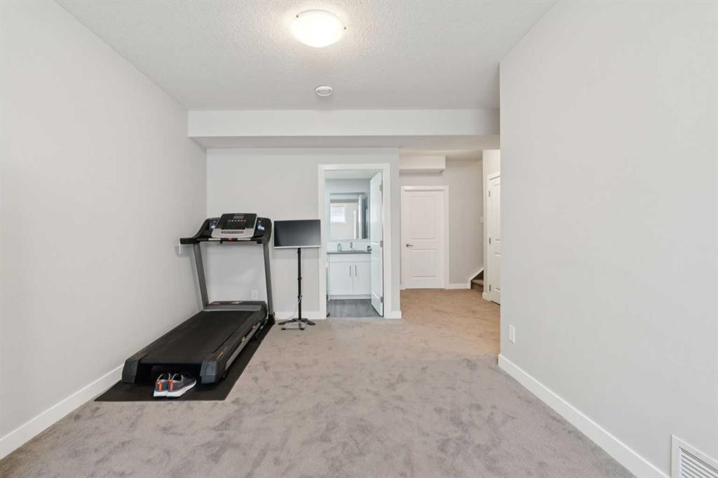52 Mahogany Way Se, Calgary, AB - Indoor Photo Showing Other Room