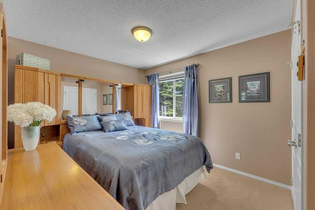 101 Valley Creek Place Nw, Calgary, AB - Indoor Photo Showing Bedroom