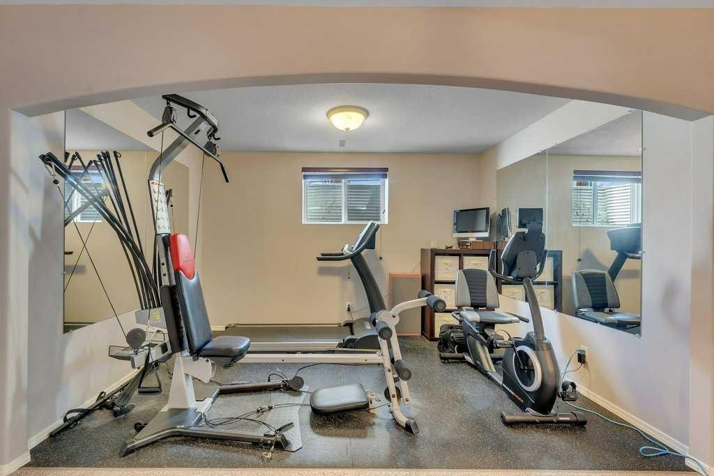 101 Valley Creek Place Nw, Calgary, AB - Indoor Photo Showing Gym Room