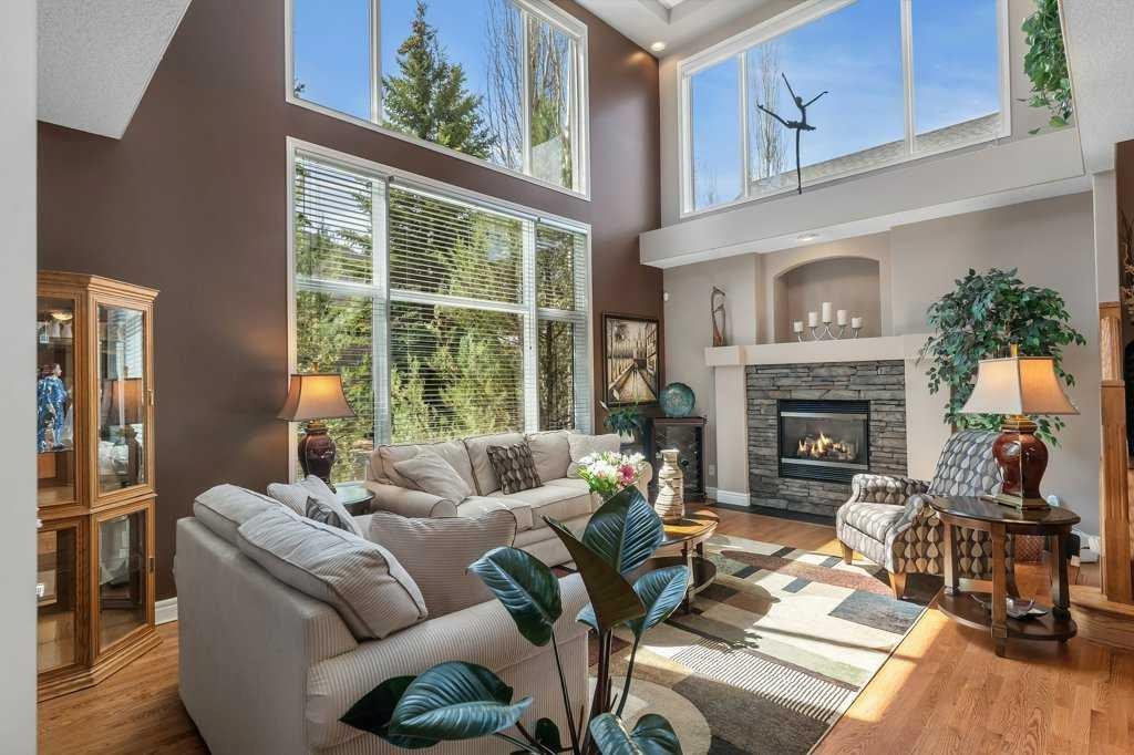 101 Valley Creek Place Nw, Calgary, AB - Indoor Photo Showing Living Room With Fireplace