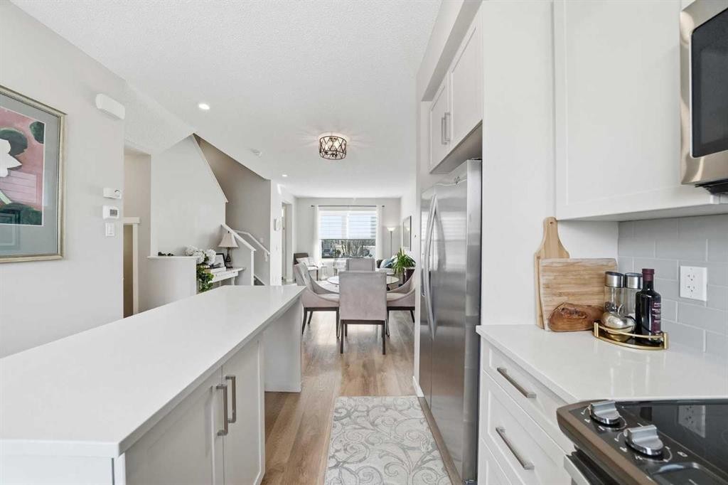 8112 Masters Boulevard Se, Calgary, AB - Indoor Photo Showing Kitchen With Upgraded Kitchen