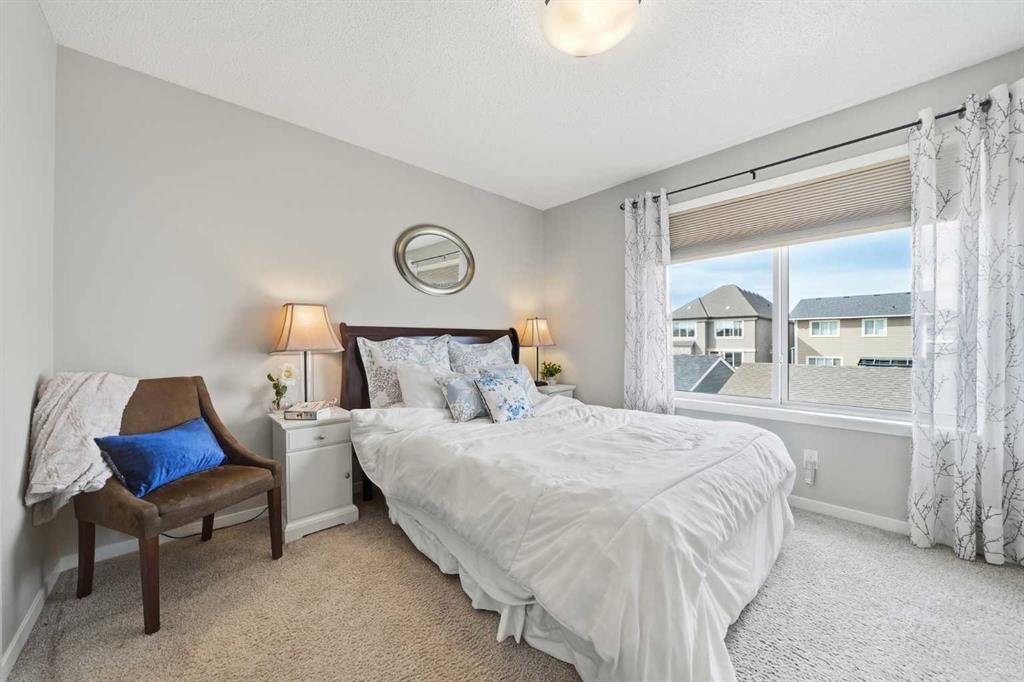 8112 Masters Boulevard Se, Calgary, AB - Indoor Photo Showing Bedroom