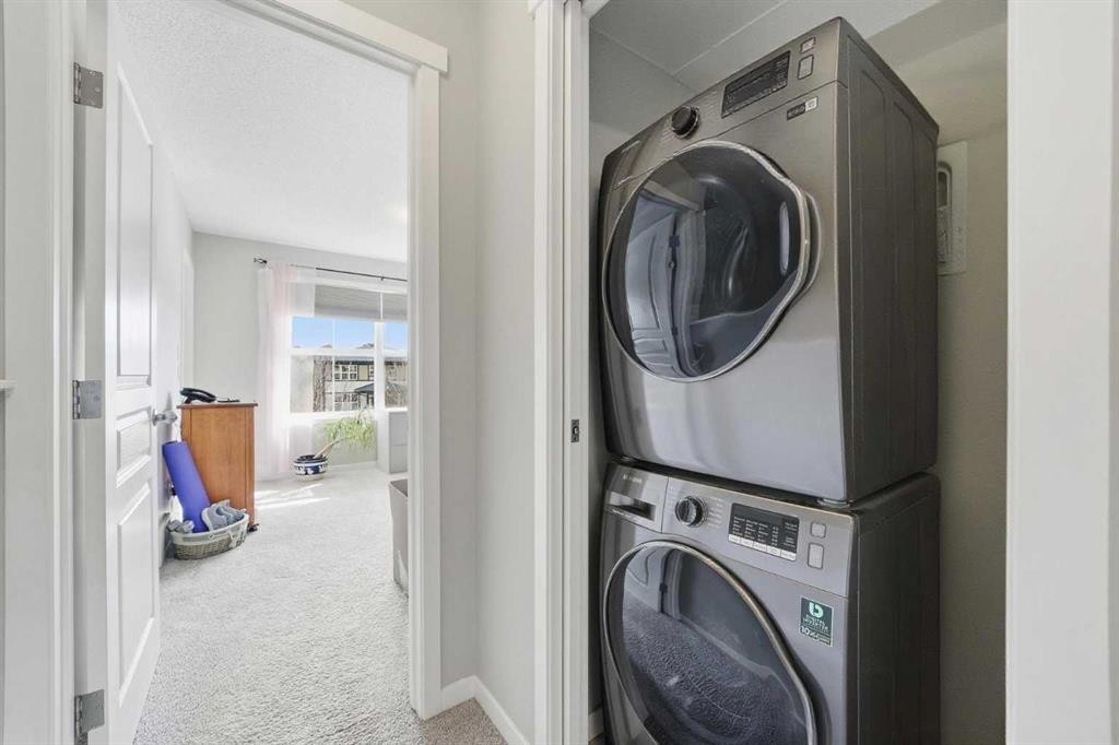 8112 Masters Boulevard Se, Calgary, AB - Indoor Photo Showing Laundry Room