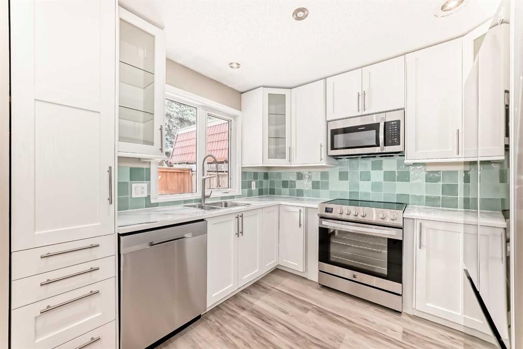 8-714 Willow Park Drive Se, Calgary, AB - Indoor Photo Showing Kitchen With Stainless Steel Kitchen