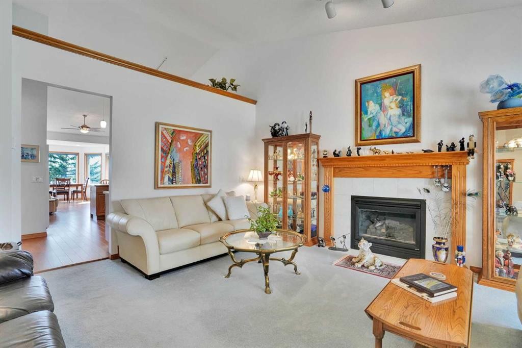 82 Valley Ridge Point Nw, Calgary, AB - Indoor Photo Showing Living Room With Fireplace
