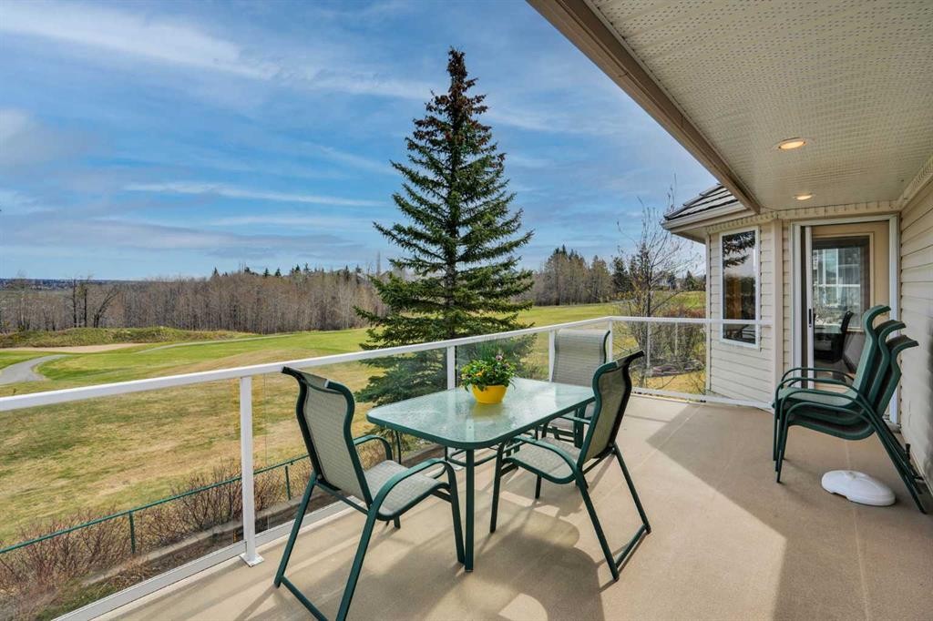 82 Valley Ridge Point Nw, Calgary, AB - Outdoor With Deck Patio Veranda With View With Exterior