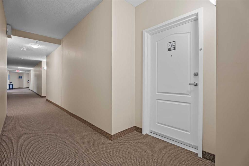 215-43 Sunrise Loop Se, High River, AB - Indoor Photo Showing Other Room