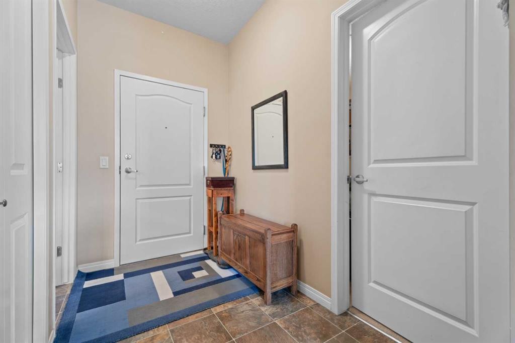 215-43 Sunrise Loop Se, High River, AB - Indoor Photo Showing Other Room