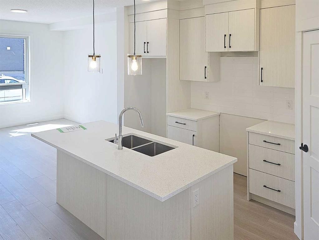 1973 Mccaskill Drive, Crossfield, AB - Indoor Photo Showing Kitchen With Double Sink