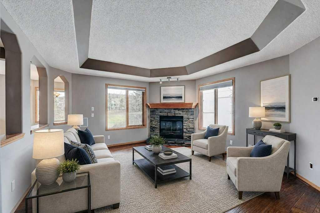 91 Valley Ridge Green Nw, Calgary, AB - Indoor Photo Showing Living Room With Fireplace