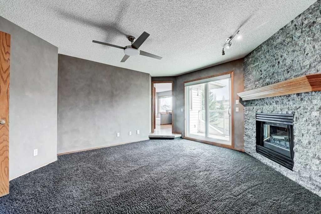 91 Valley Ridge Green Nw, Calgary, AB - Indoor With Fireplace