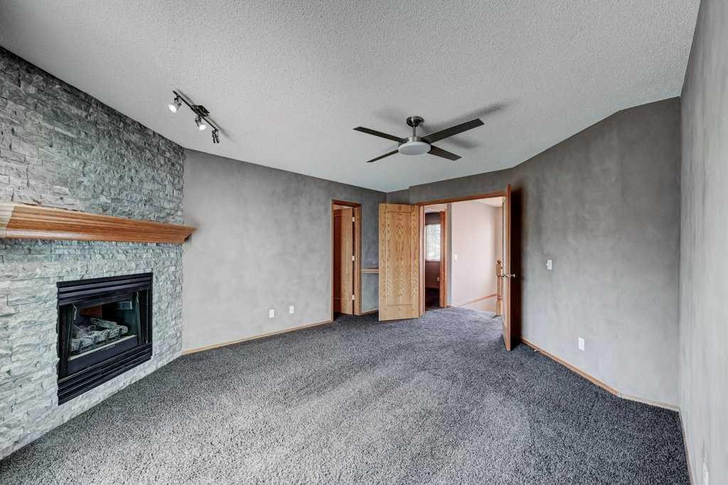 91 Valley Ridge Green Nw, Calgary, AB - Indoor With Fireplace