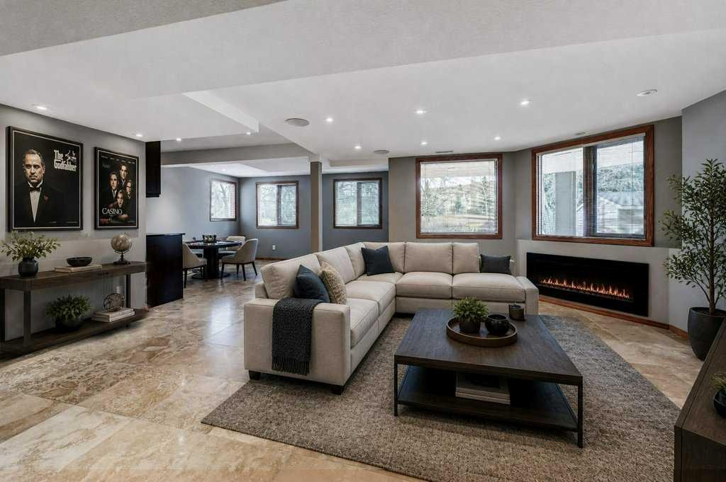 91 Valley Ridge Green Nw, Calgary, AB - Indoor Photo Showing Living Room With Fireplace