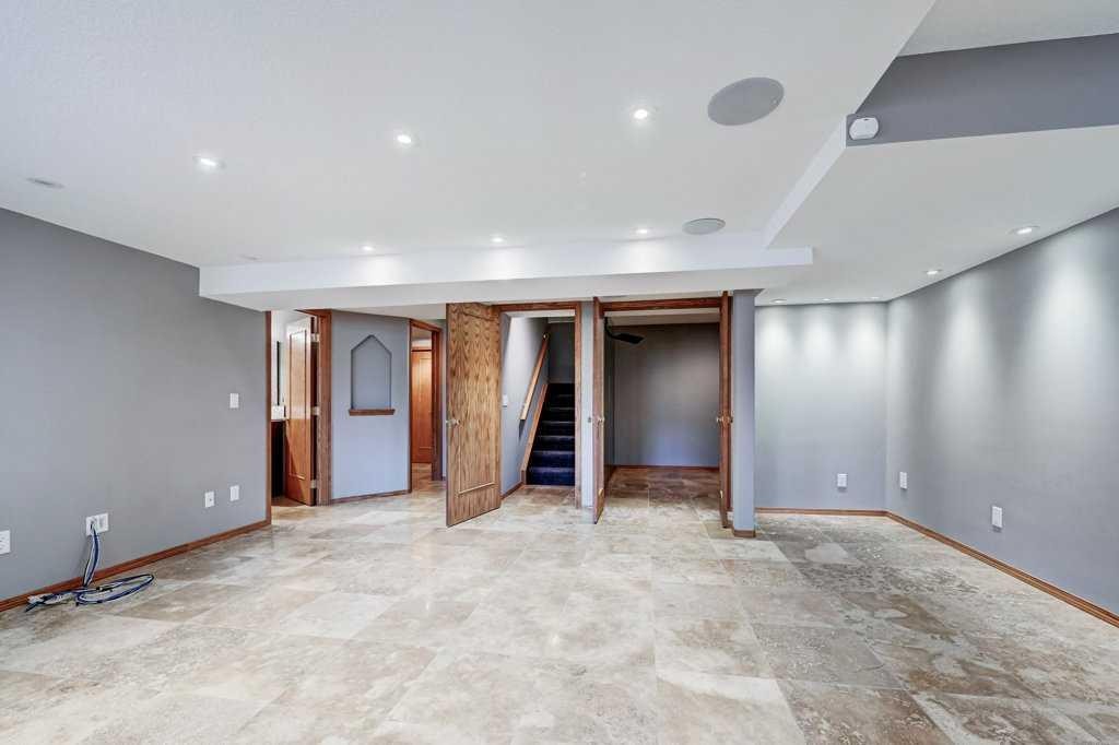 91 Valley Ridge Green Nw, Calgary, AB - Indoor Photo Showing Basement