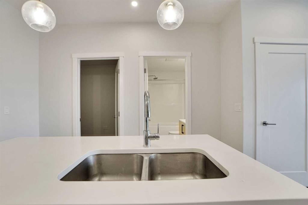 405-138 Sage Valley Common Nw, Calgary, AB - Indoor Photo Showing Kitchen With Double Sink