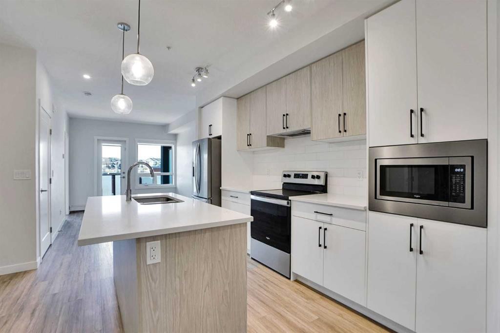 405-138 Sage Valley Common Nw, Calgary, AB - Indoor Photo Showing Kitchen With Upgraded Kitchen