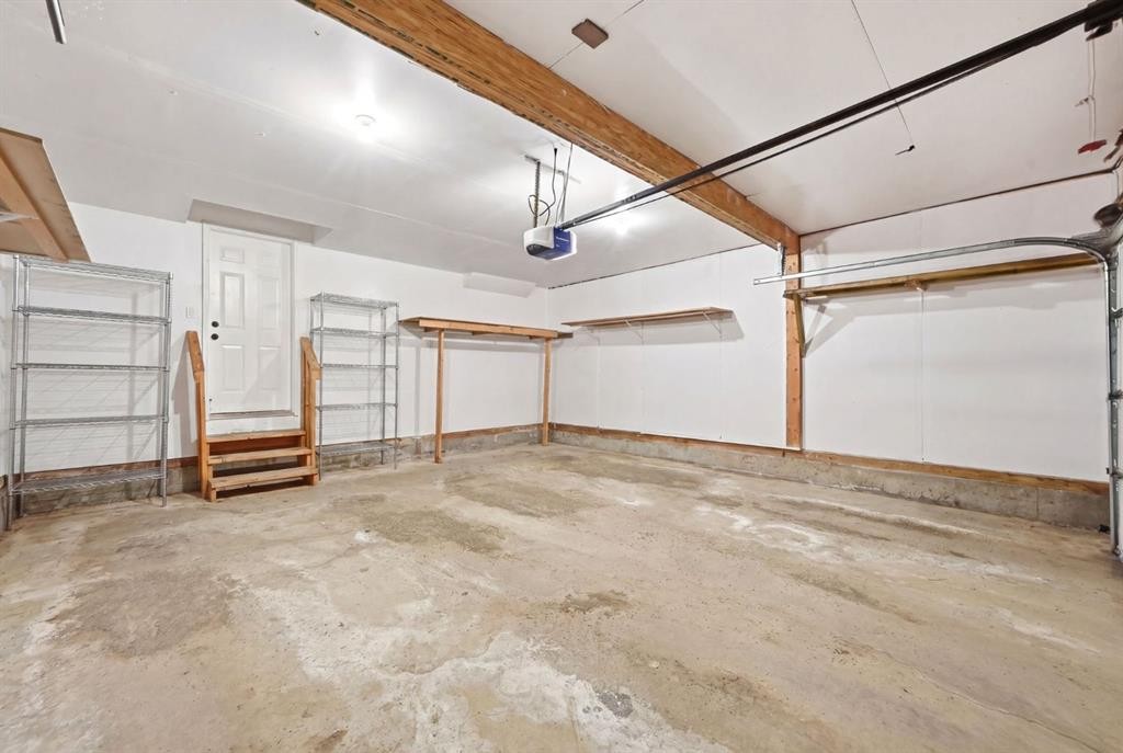 193 Hidden Creek Road Nw, Calgary, AB - Indoor Photo Showing Garage