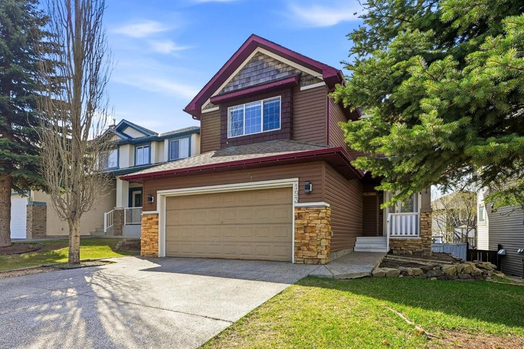 193 Hidden Creek Road Nw, Calgary, AB - Outdoor With Facade