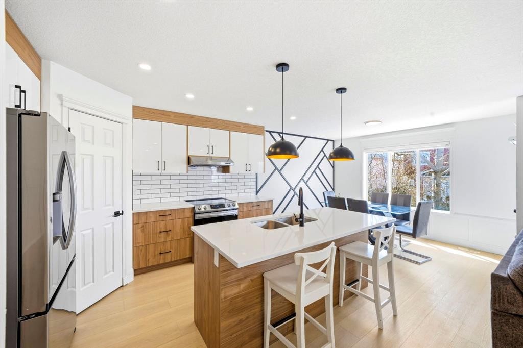 193 Hidden Creek Road Nw, Calgary, AB - Indoor Photo Showing Kitchen With Upgraded Kitchen