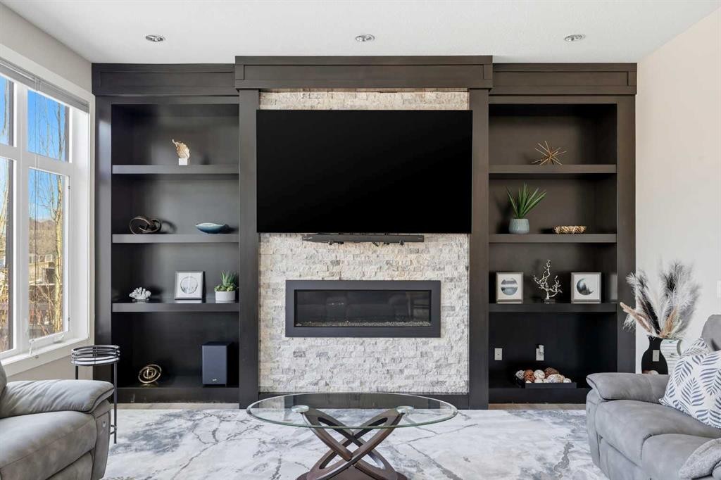 75 Aspen Summit Court Sw, Calgary, AB - Indoor Photo Showing Living Room With Fireplace