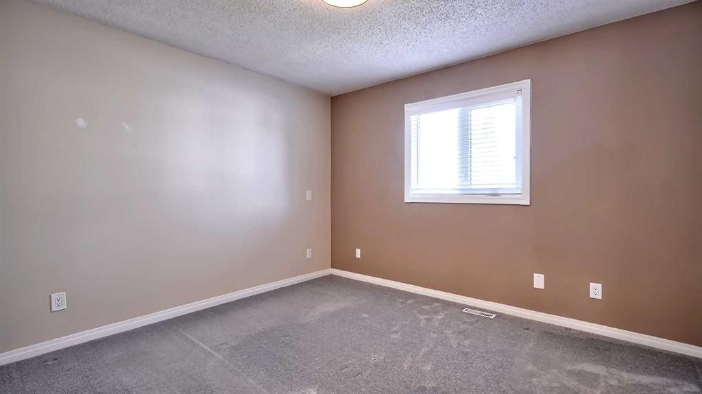 48 Riverbrook Road Se, Calgary, AB - Indoor Photo Showing Other Room
