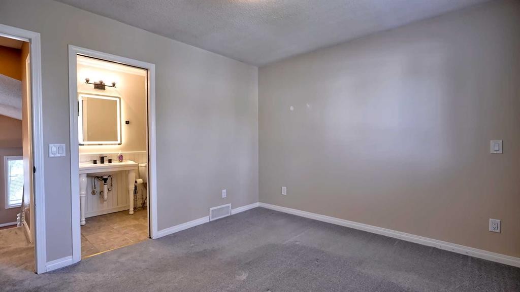 48 Riverbrook Road Se, Calgary, AB - Indoor Photo Showing Other Room