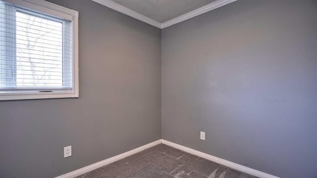 48 Riverbrook Road Se, Calgary, AB - Indoor Photo Showing Other Room