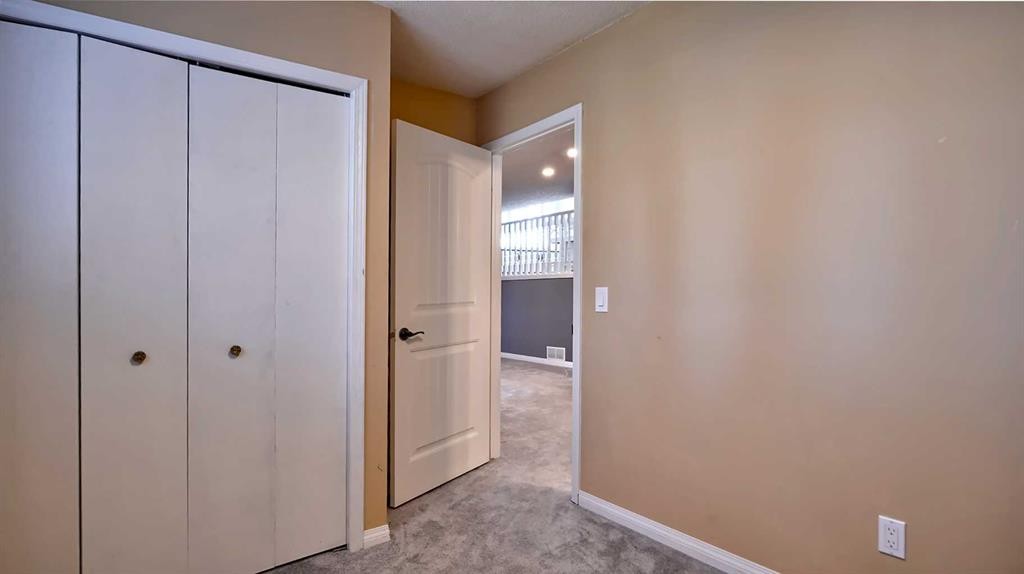 48 Riverbrook Road Se, Calgary, AB - Indoor Photo Showing Other Room