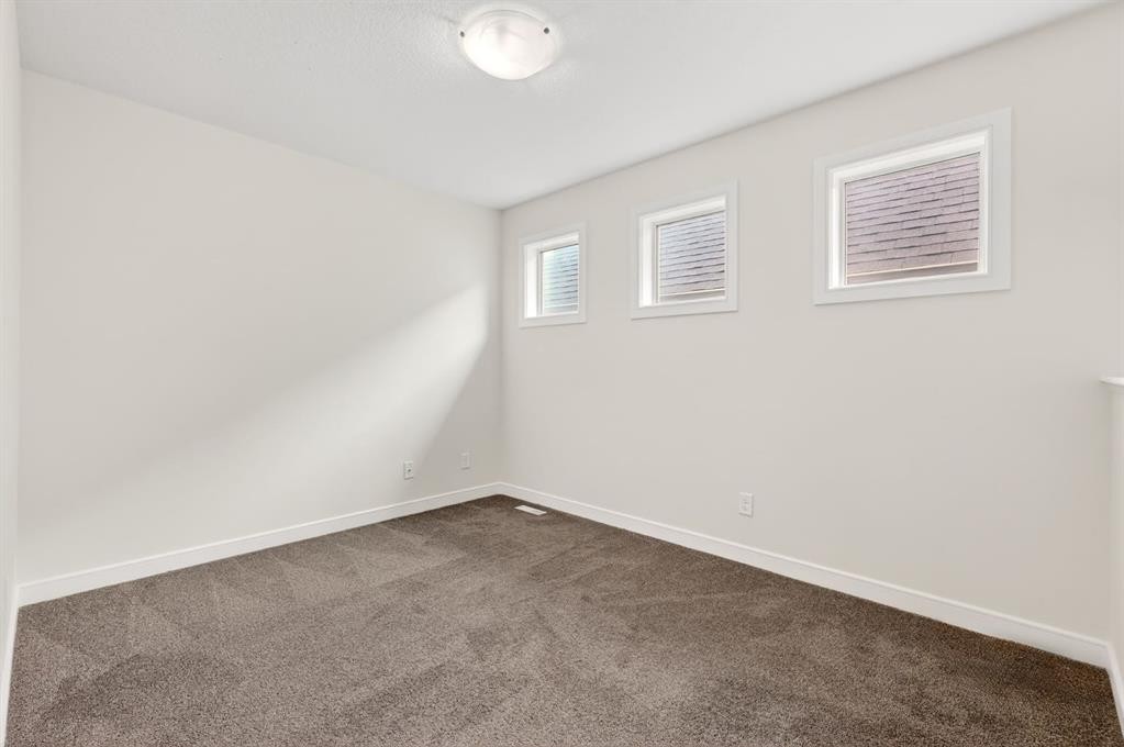 123 Evanscrest Way Nw, Calgary, AB - Indoor Photo Showing Other Room