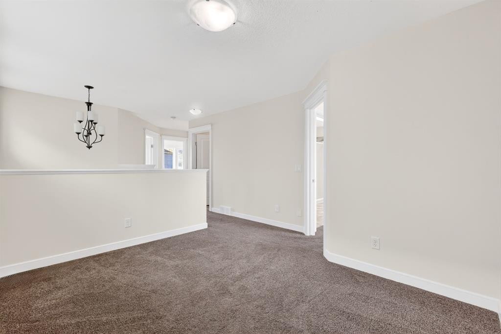 123 Evanscrest Way Nw, Calgary, AB - Indoor Photo Showing Other Room