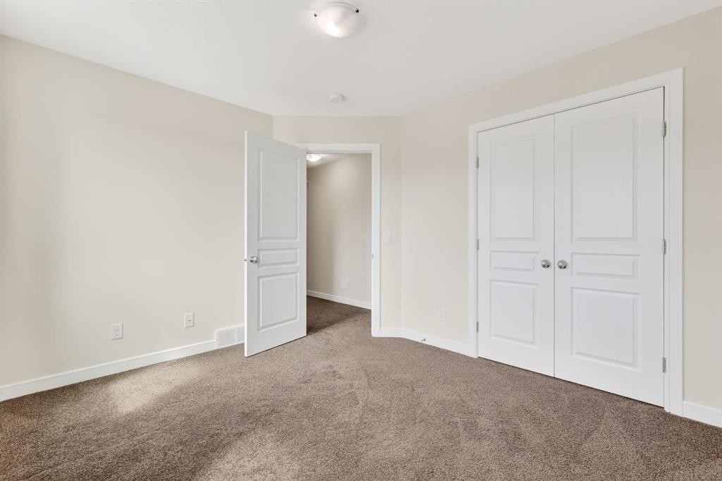 123 Evanscrest Way Nw, Calgary, AB - Indoor Photo Showing Other Room