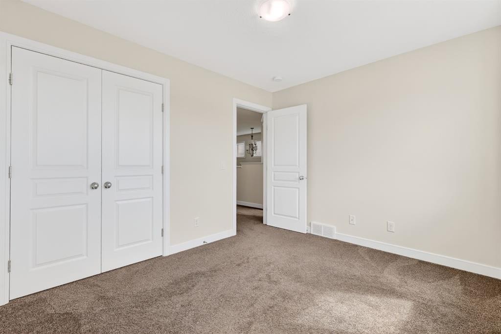 123 Evanscrest Way Nw, Calgary, AB - Indoor Photo Showing Other Room