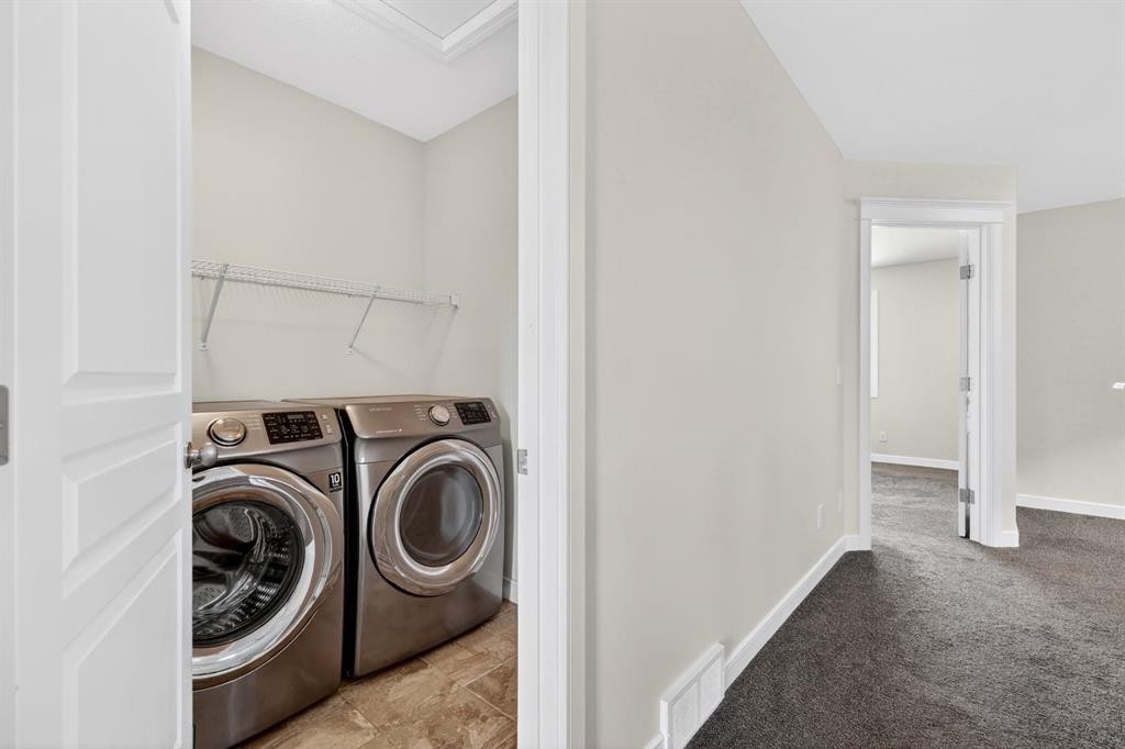 123 Evanscrest Way Nw, Calgary, AB - Indoor Photo Showing Laundry Room