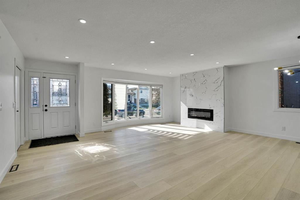 20 Templehill Crescent Ne, Calgary, AB - Indoor Photo Showing Living Room With Fireplace