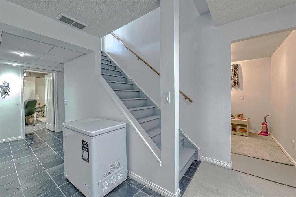 111 West Springs Way Sw, Calgary, AB - Indoor Photo Showing Other Room