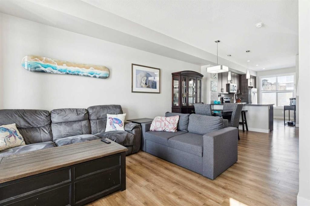 116 Seton Passage Se, Calgary, AB - Indoor Photo Showing Living Room