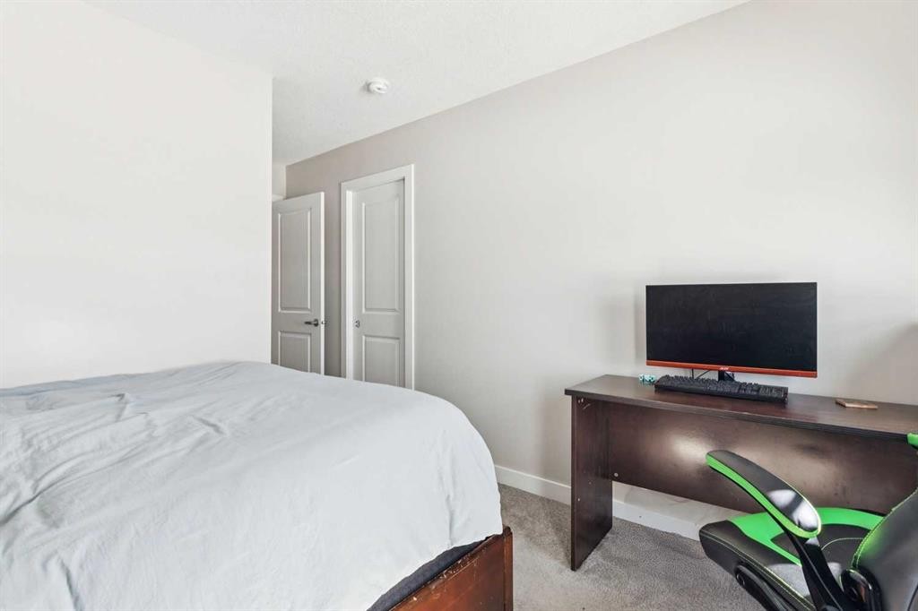 116 Seton Passage Se, Calgary, AB - Indoor Photo Showing Bedroom