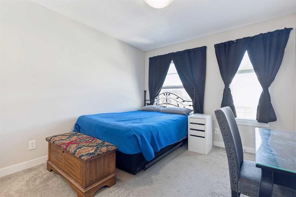 116 Seton Passage Se, Calgary, AB - Indoor Photo Showing Bedroom