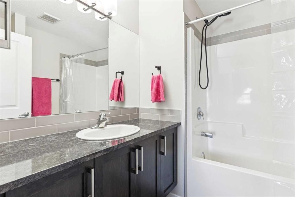 116 Seton Passage Se, Calgary, AB - Indoor Photo Showing Bathroom