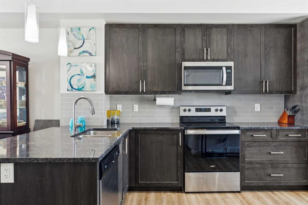 116 Seton Passage Se, Calgary, AB - Indoor Photo Showing Kitchen With Stainless Steel Kitchen With Upgraded Kitchen