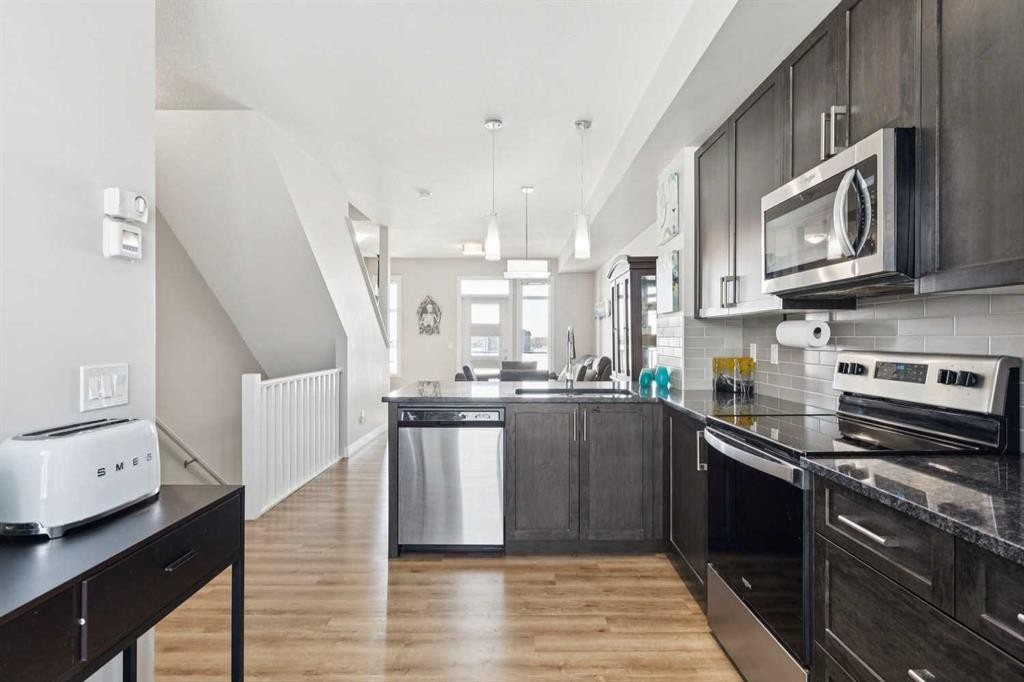 116 Seton Passage Se, Calgary, AB - Indoor Photo Showing Kitchen With Upgraded Kitchen
