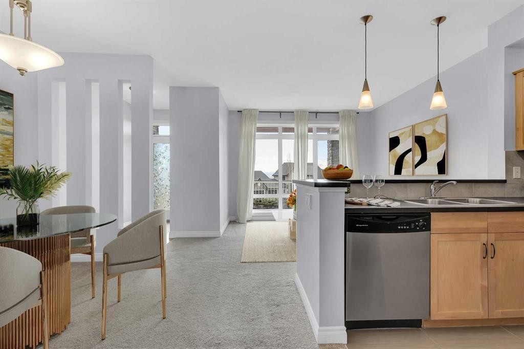 7-181 Rockyledge View Nw, Calgary, AB - Indoor Photo Showing Kitchen With Double Sink