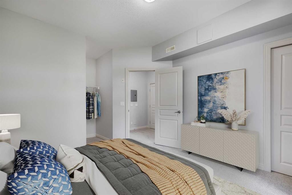 7-181 Rockyledge View Nw, Calgary, AB - Indoor Photo Showing Bedroom